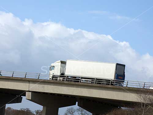 Truck on a motorway with copy space
